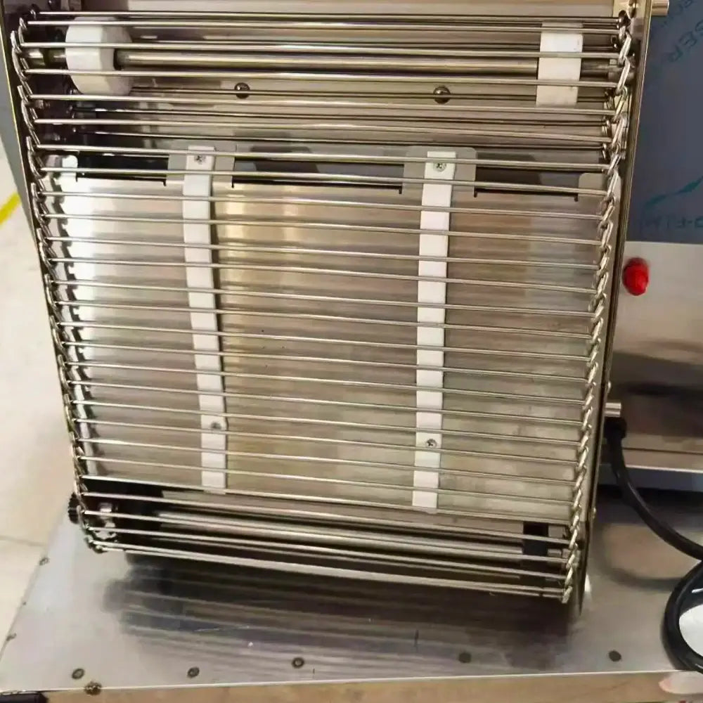 Tenshine hamburger bun toaster showing heavy-duty stainless steel wire belt conveyor for jam-free, continuous commercial frying operations.