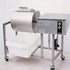 Commercial electric meat marinator and tumbler with stainless steel drum and collection bin. Automatic marinating machine for fried chicken and meat processing
