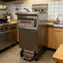 Tenshine TS-OFE126 electric open fryer professionally installed in a busy commercial restaurant kitchen.