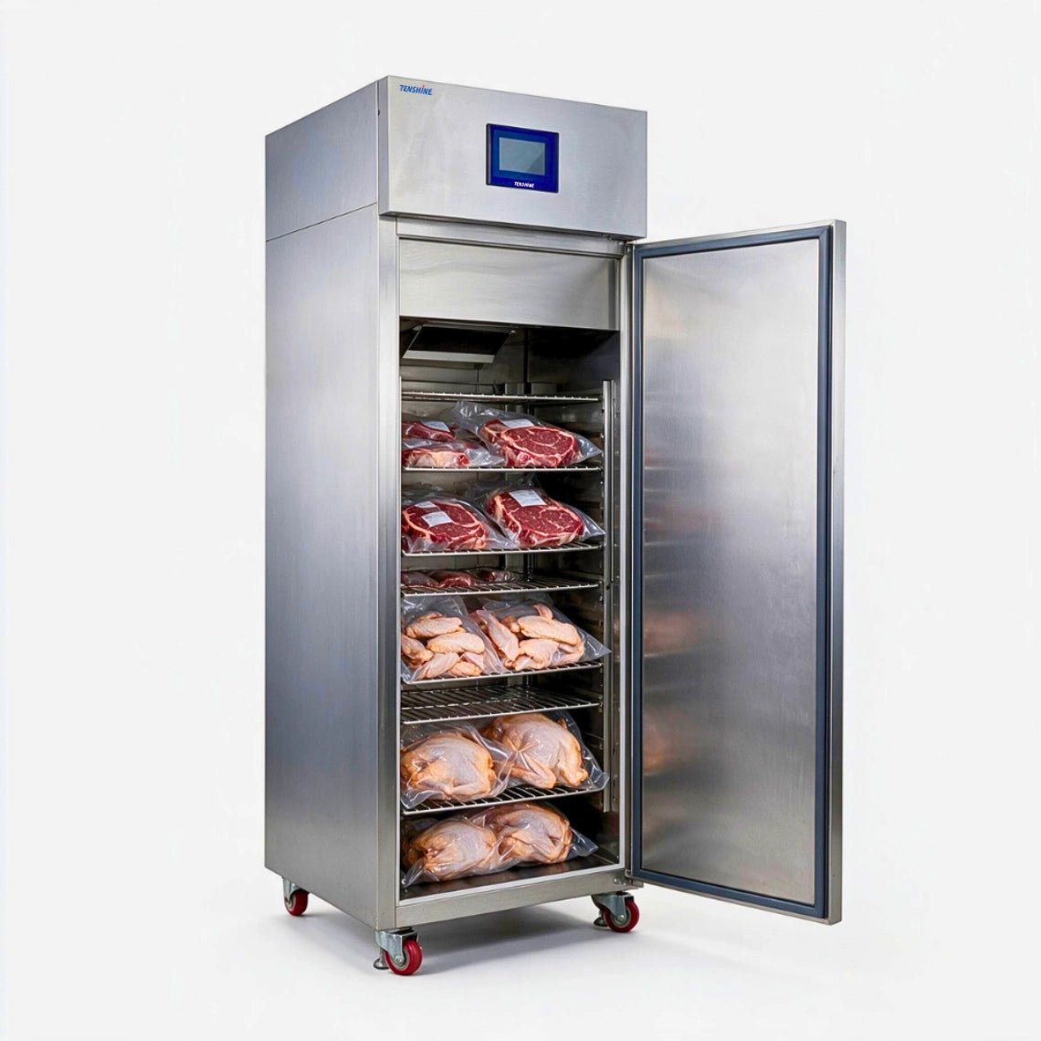 Open commercial meat defroster cabinet showing up to 110 lbs of frozen poultry and steaks on stainless steel racks for rapid defrosting.