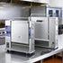 Front and back view of the space-saving slim-line commercial vertical contact toaster, designed for crowded restaurant kitchens.
