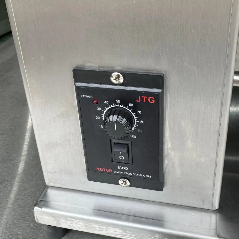 Close-up of the highly durable digital motor and variable speed control knob on the commercial vertical contact bun toaster.
